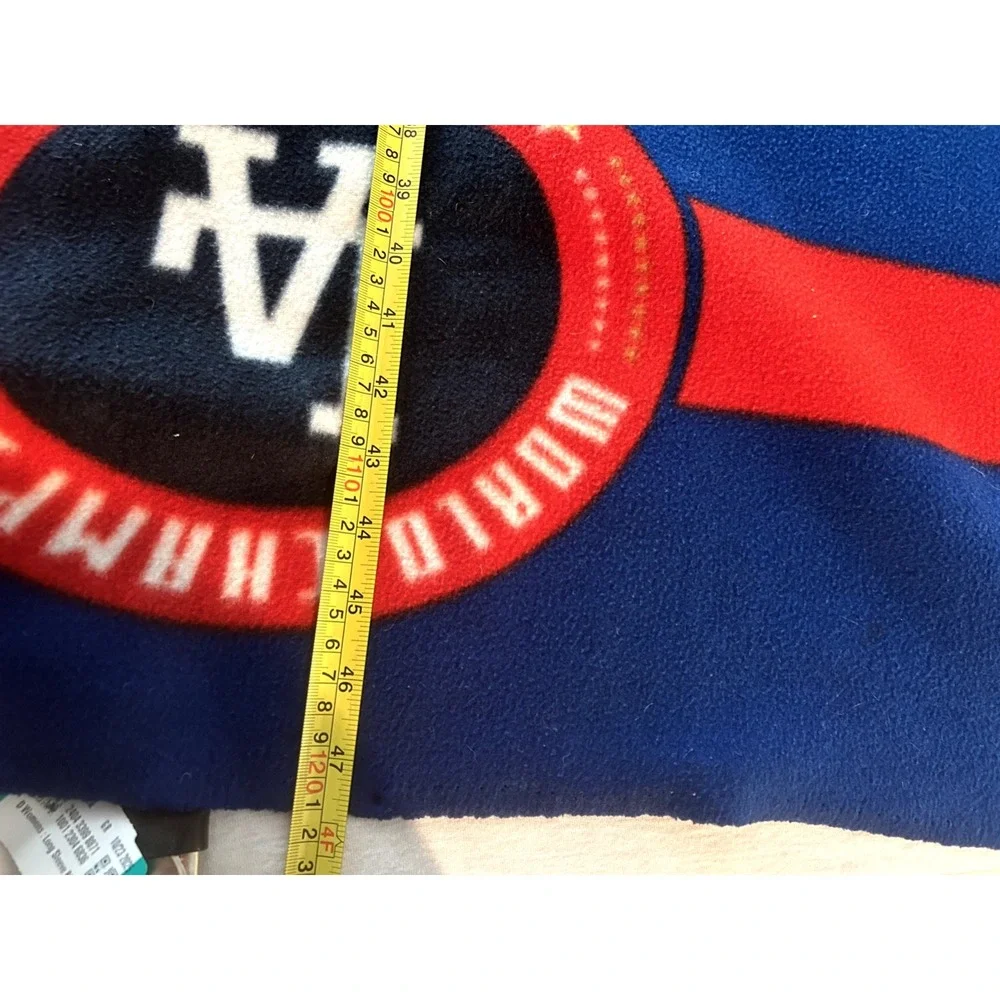 LA Dodgers blanket with logo and list of world series champioships‎